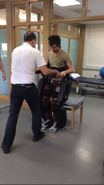 Wheelchair- bound man able to walk again using robotic suit